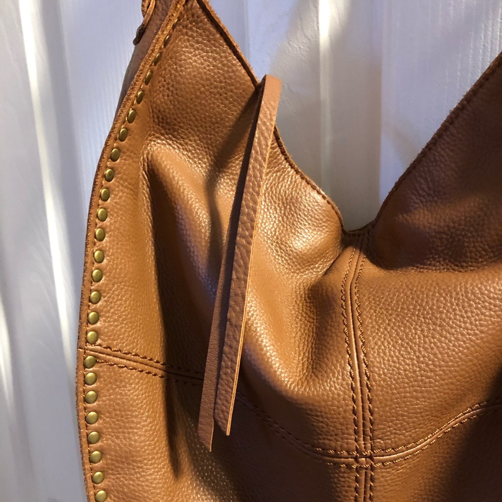 the Sak brown leather purse